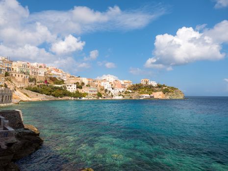 View of Syros town with beautiful buildings and houses in a sunny day