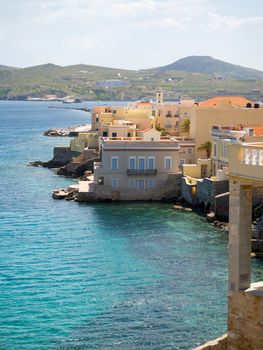 View of Syros town with beautiful buildings and houses in a sunny day