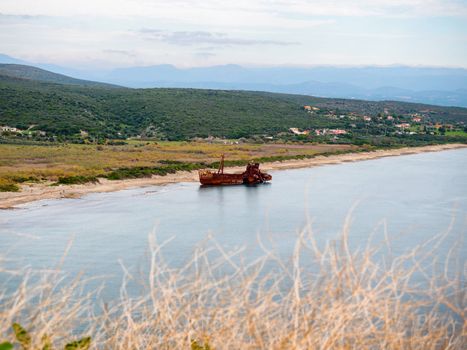 Old rusty shipwreck Agios Dimitrios on the beach in Githeio,Peloponnese, Greece