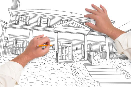 Male Hands Sketching with Pencil the Outline of a Beautiful House on White.