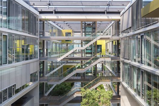 Main hall, staircase and windows of morden office building. Contemporary corporate business architecture.