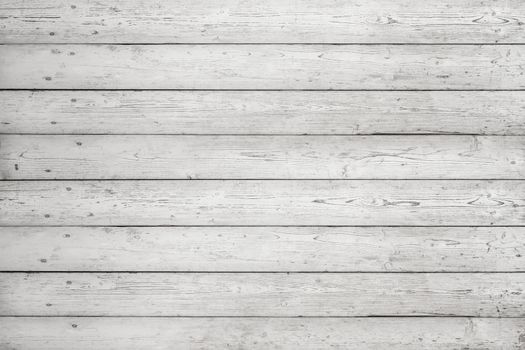 White wooden boards with texture as background. White planks