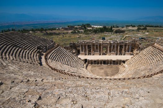 Roman amphitheatre in the ruins of Hierapolis, in Pamukkale, near modern turkey city Denizli, Turkey.