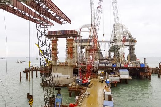 Construction of the bridge. Engineering facilities for the construction of a railway and automobile bridge across the strait.