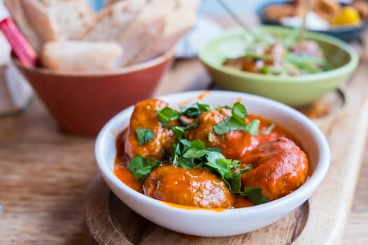 Close up view of pork and beef meatball tapas