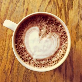 Heart drawing on a cup of tasty hot chocolate.