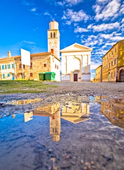 Town of Vizinada old cobbled square water reflection view, Istria region of Croatia