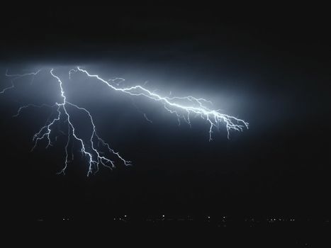 Lightning in the sky. Electric discharges in the sky.