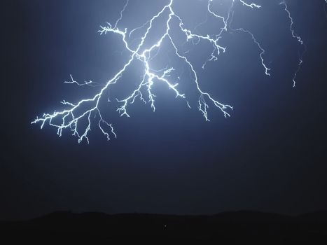 Lightning in the sky. Electric discharges in the sky.