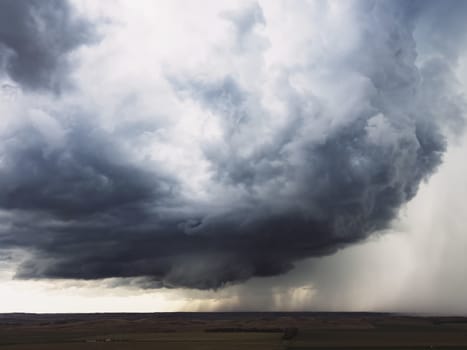 The sky is clear. Cumulus clouds and rain clouds. Storm