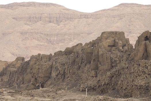 Buildings and columns of ancient Egyptian megaliths. Ancient ruins of Egyptian buildings