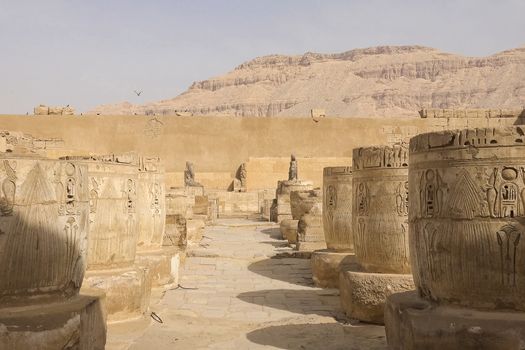 Buildings and columns of ancient Egyptian megaliths. Ancient ruins of Egyptian buildings