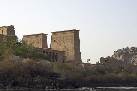 Buildings and columns of ancient Egyptian megaliths. Ancient ruins of Egyptian buildings