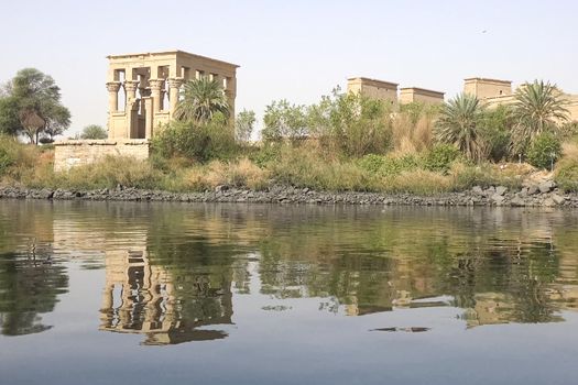 Buildings and columns of ancient Egyptian megaliths. Ancient ruins of Egyptian buildings