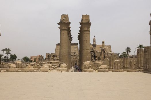 Buildings and columns of ancient Egyptian megaliths. Ancient ruins of Egyptian buildings