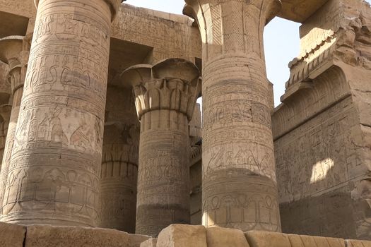 Egyptian hieroglyphs and drawings on the walls and columns. Egyptian language, The life of ancient gods and people in hieroglyphics and drawings