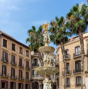 Water fountain in the city of Malaga, Spain, Europe on a sunny morning