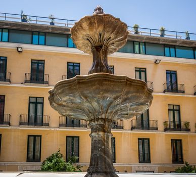 Water fountain in the city of Malaga, Spain, Europe on a sunny morning