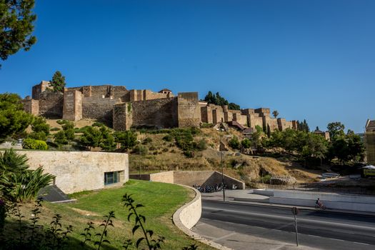 Gibralfaro castle (Alcazaba de Malaga), Malaga, Costa del Sol, Spain, Europe on a bright summer day with blue sky