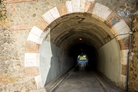 Tunnel in the hill overlooking the city of malaga, Spain, Europe on a bright summer day