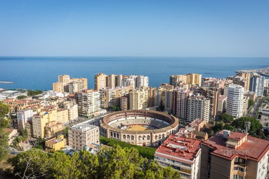 aerial view of Malagueta district and La Malagueta Bullring in Malaga, Spain, Europe on a bright summer day with blue sky