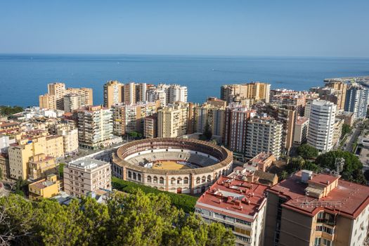 aerial view of Malagueta district and La Malagueta Bullring in Malaga, Spain, Europe on a bright summer day with blue sky