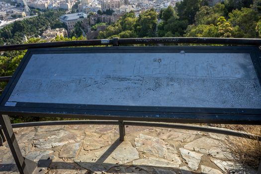 Cityscape of Malaga on a metal plat at the view point in Malaga, Spain, Europe on a summer day