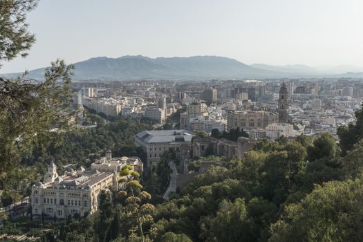 Cityscape aerial view of Malaga, Spain. The Cathedral of Malaga is a Renaissance church in the city of Malaga in Andalusia in southern Spain during sunset