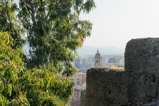 Cityscape aerial view of Malaga, Spain. The Cathedral of Malaga is a Renaissance church in the city of Malaga in Andalusia in southern Spain during sunset