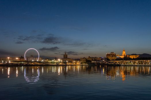 View of malaga city from harbour, Malaga, spain, Europe at golden sunset hour