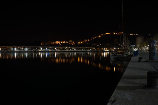 View of Alcazaba from harbour, Malaga, spain, Europe at night