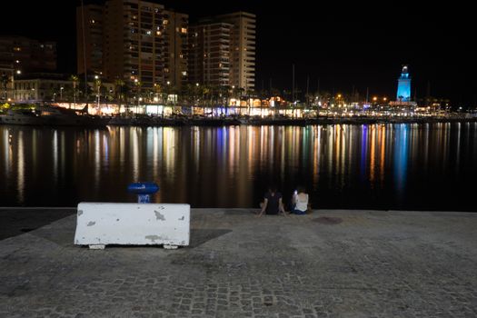 View of Malaga city from harbour, Malaga, spain, Europe at night with illuminations