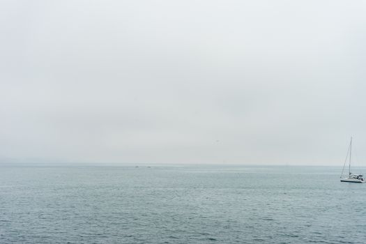 A lonely boat in the sea at Malaga, Spain, Europe on a cloudy morning