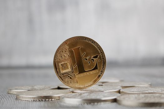 Digital currency physical gold litecoin coin on silver bitcoins.