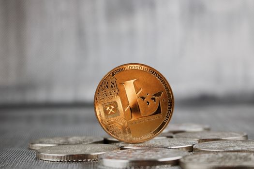 Digital currency physical gold litecoin coin on the silver bitcoin coins.