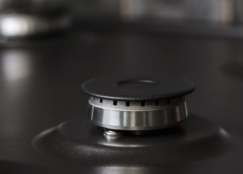 new gas burner close-up on a black background