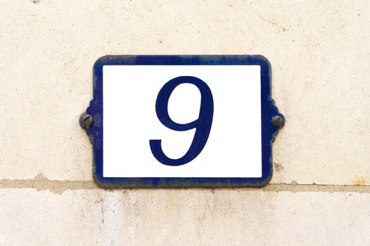 House number  nine (9)