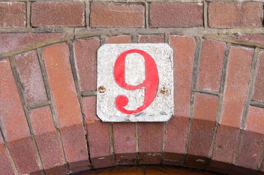 House number  nine (9)