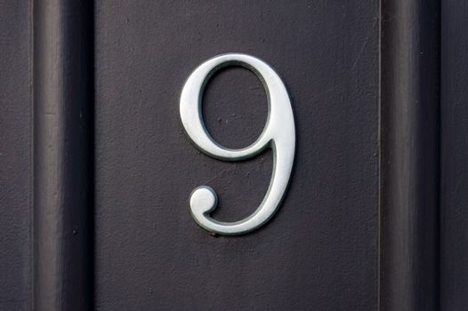 House number  nine (9)