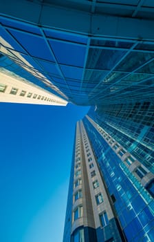 Modern building exterior low angle view with blue sky