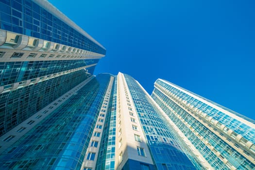 Modern building exterior low angle view with blue sky