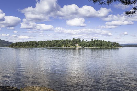 Utoya island with green forest and a house in norway near Oslo where Breitvik sho