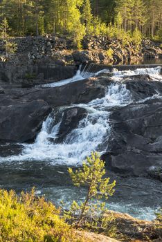 waterfall in norway near the jotunheimen national park