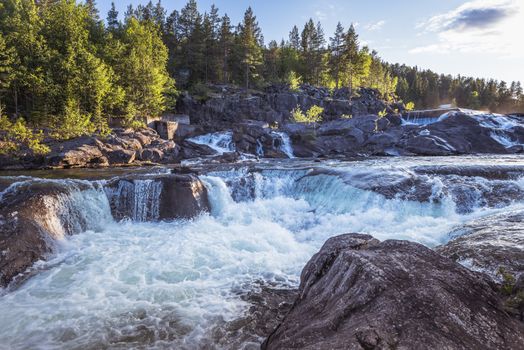 waterfall in norway near the jotunheimen national park in the village Leira