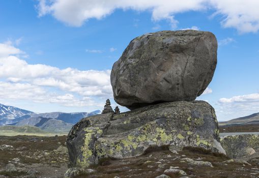 big rocks and stack mof small stones in norway on the valdreslfya famous road