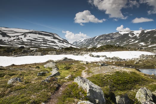 gamle strynefjellsvegen one of the most beautifull auto roads in norway with snow in summer 