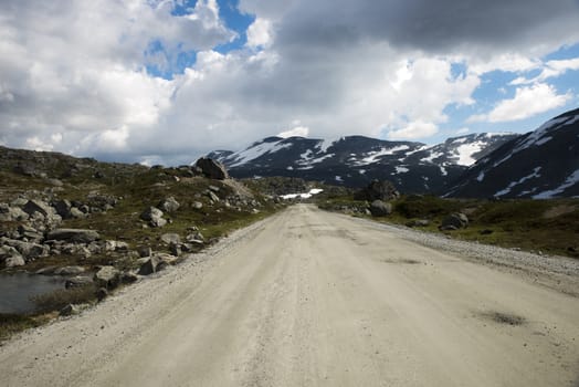 gamle strynefjellsvegen road one of the most beautifull auto roads in norway with snow in summer 