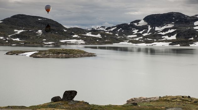 hot air balloon over the famous County Road 55. Highest mountain road in Norway, part of National Tourist Route