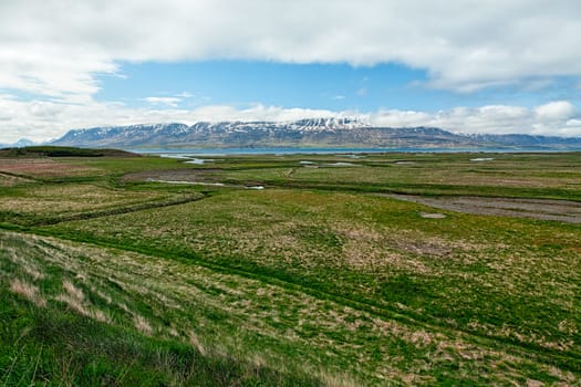 Meadows and mountains in Laufas near Akureyri in northern Iceland