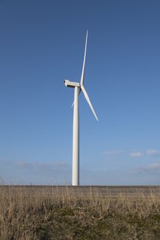 wind turbine for generating electricity with blue sky